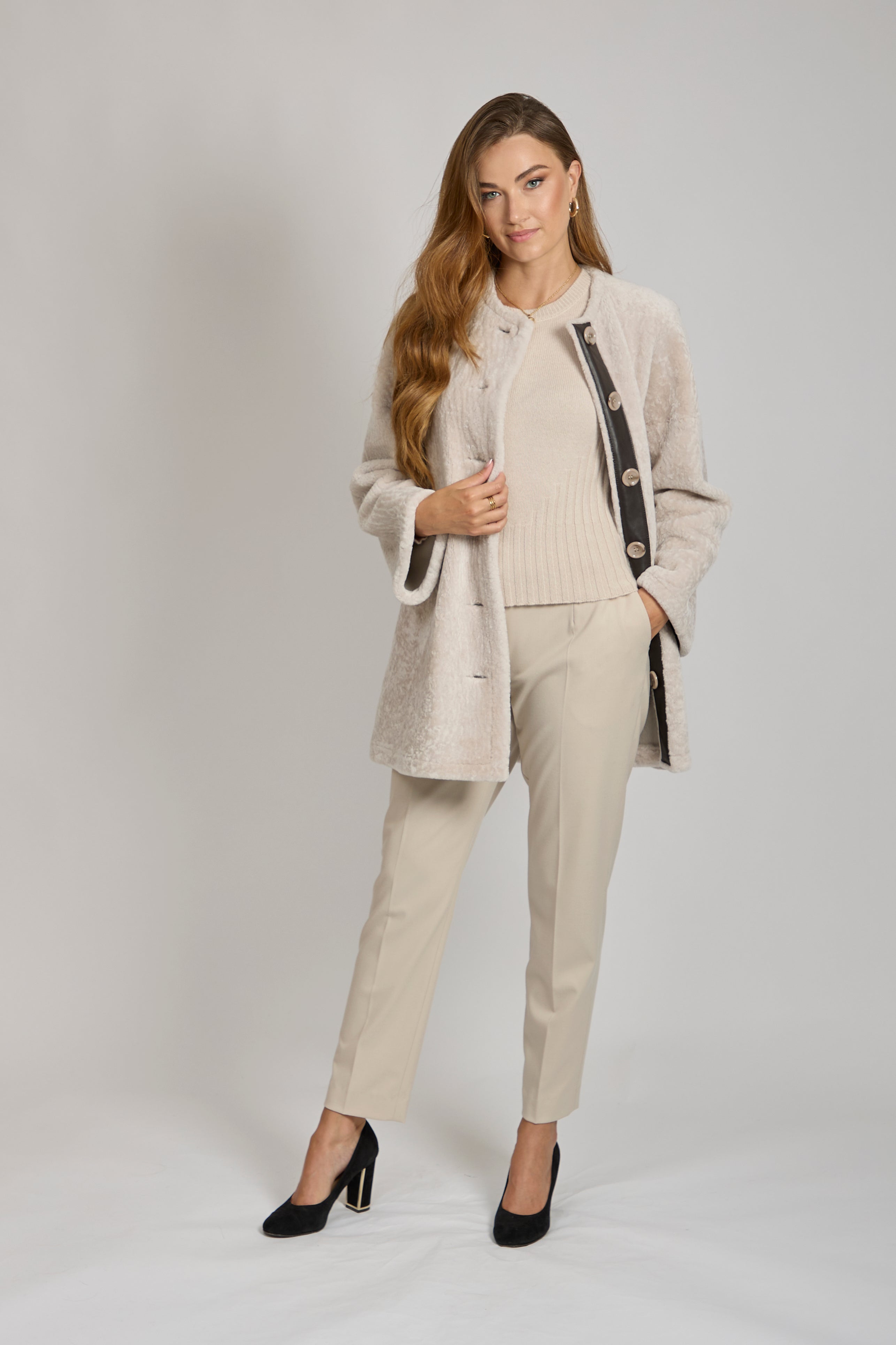 Manteau en peau lainée angora