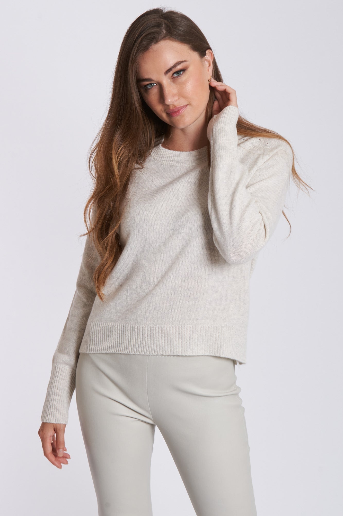 Divine Cashmere crew neck sweater in soft cashmere, fine knit with ribbed neckline, cuffs, and hem.