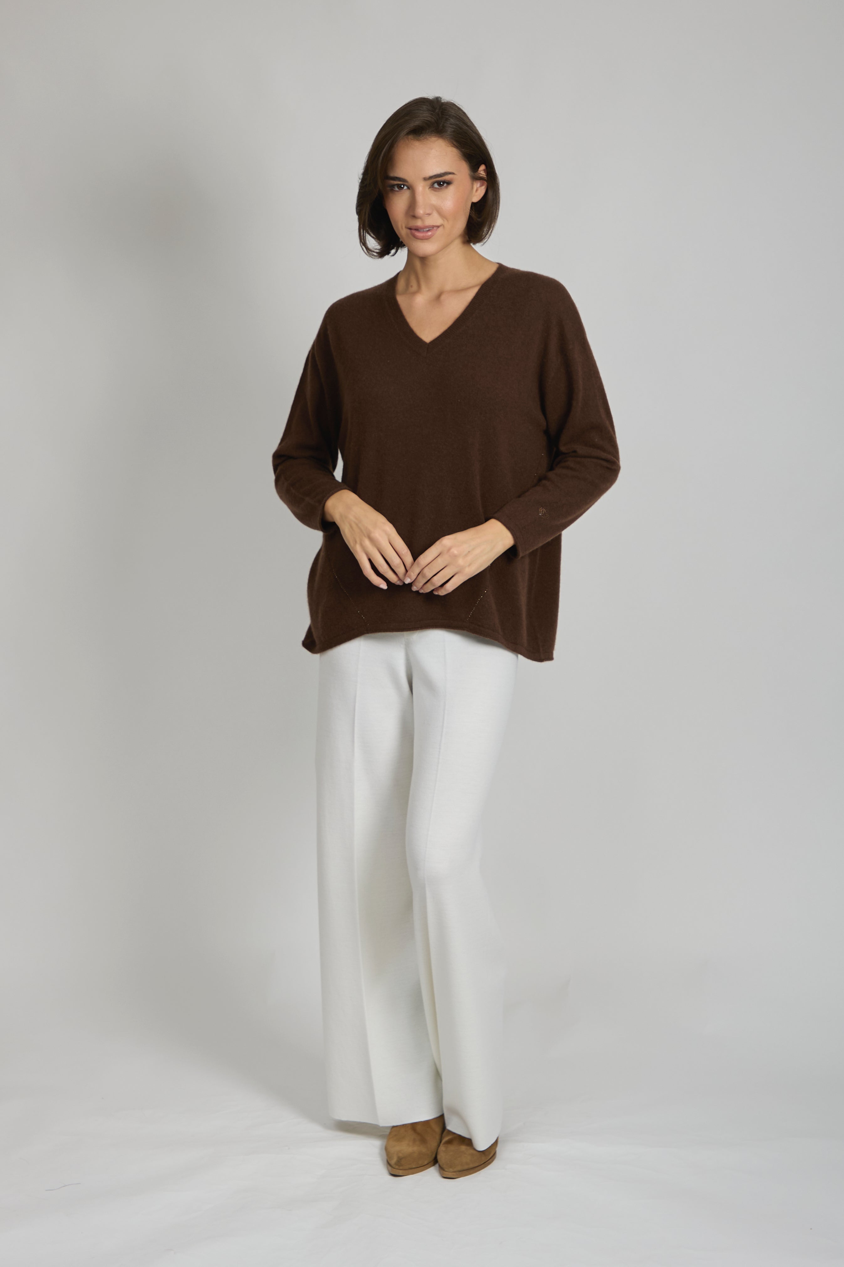 Divine Cashmere V-neck cashmere jumper with sequin embellishment.