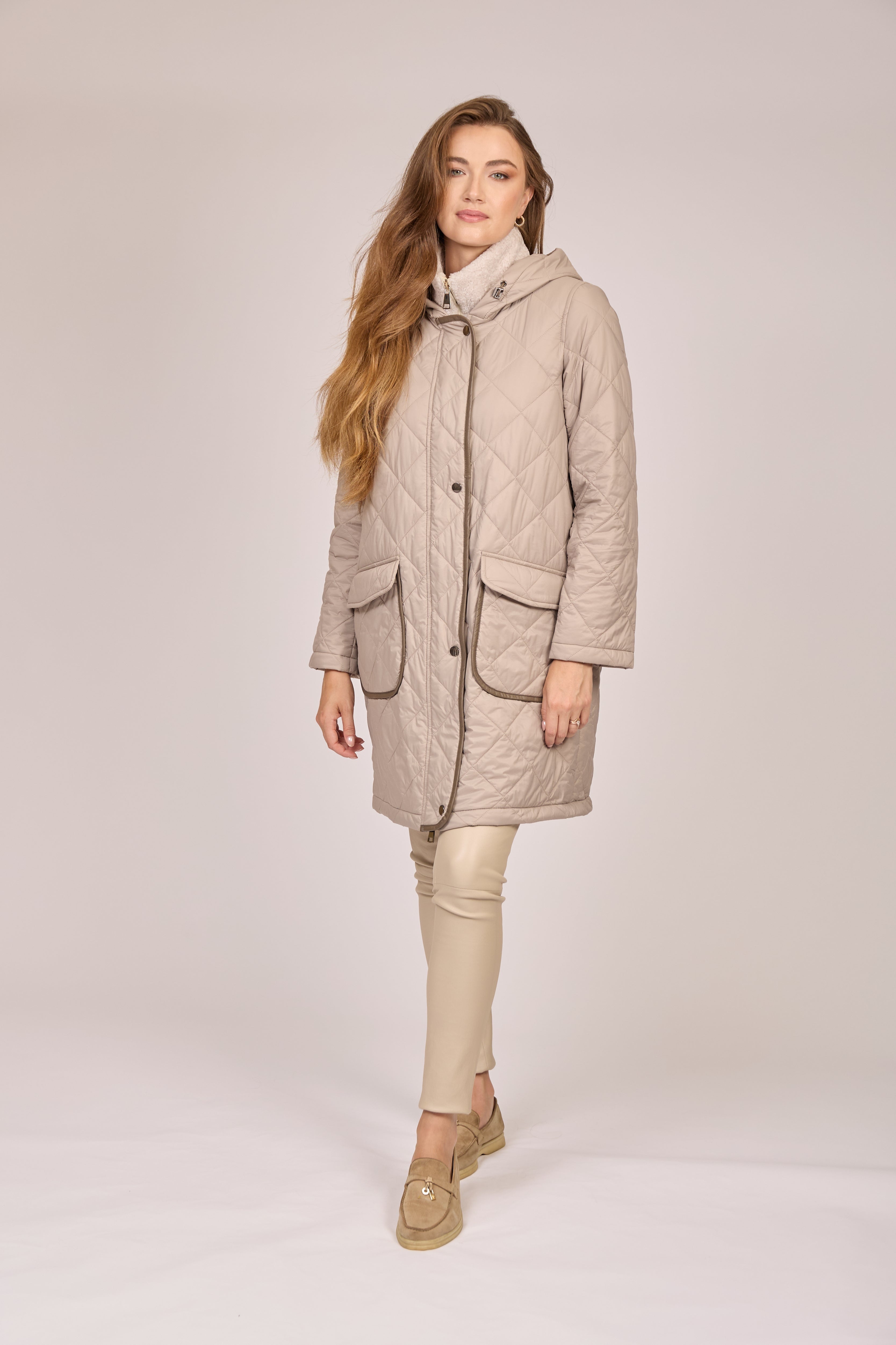 Divine Cashmere hooded quilted coat with horizontal quilting, oversized hood and mid-length silhouette