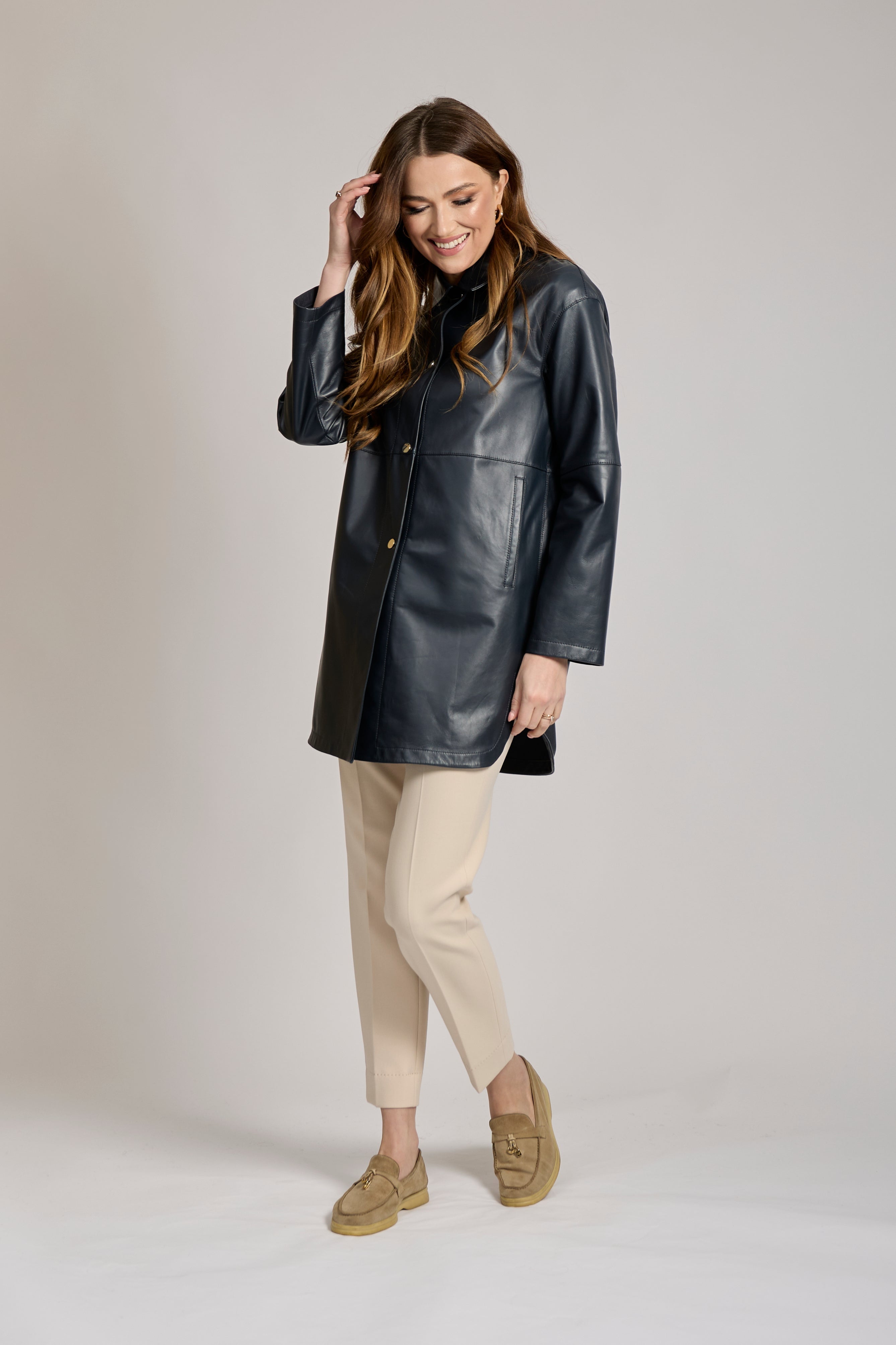Classic cut leather coat with notched lapel and tailored silhouette by Divine Cashmere