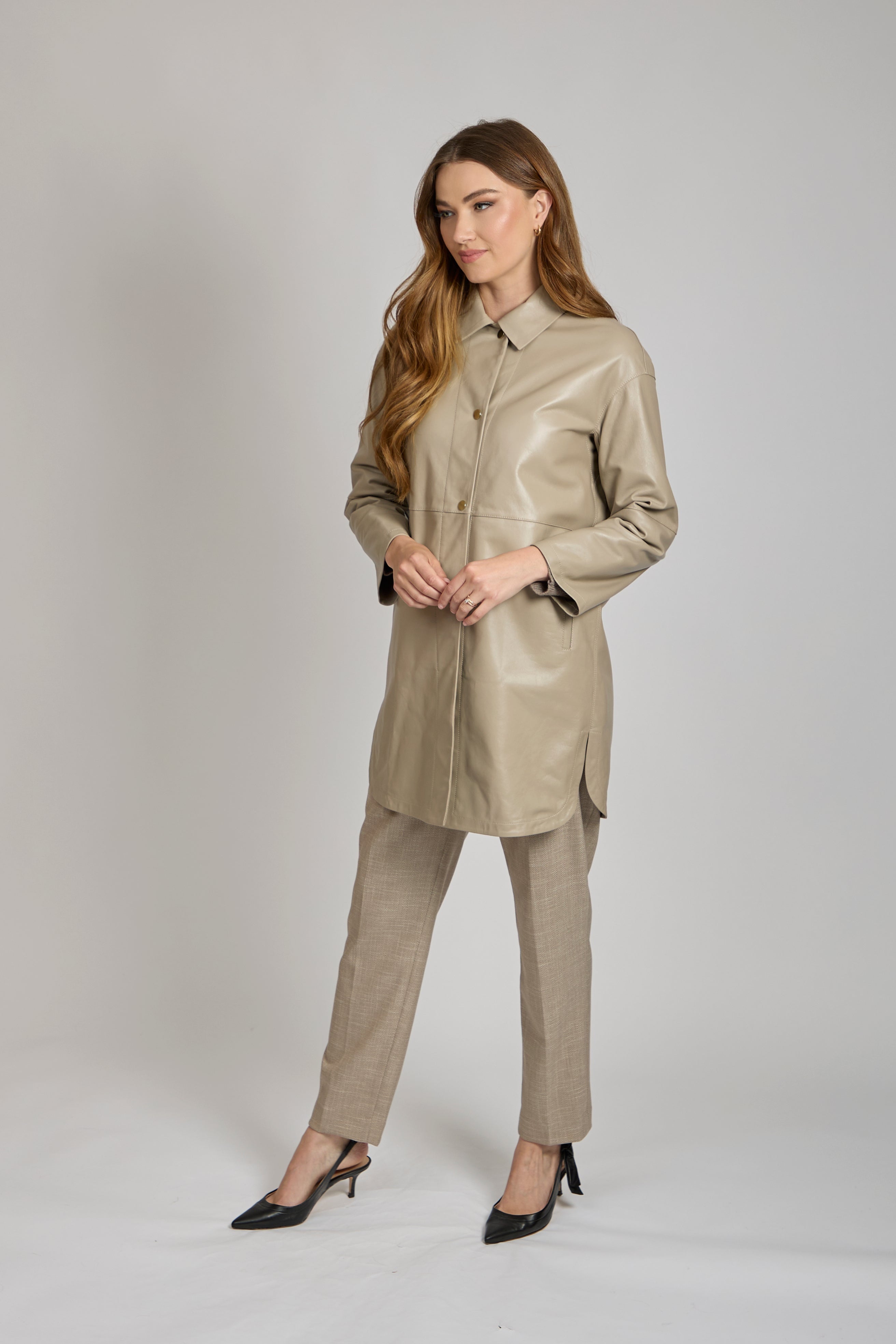 Longline leather coat with tailored silhouette, collar and full-length sleeves