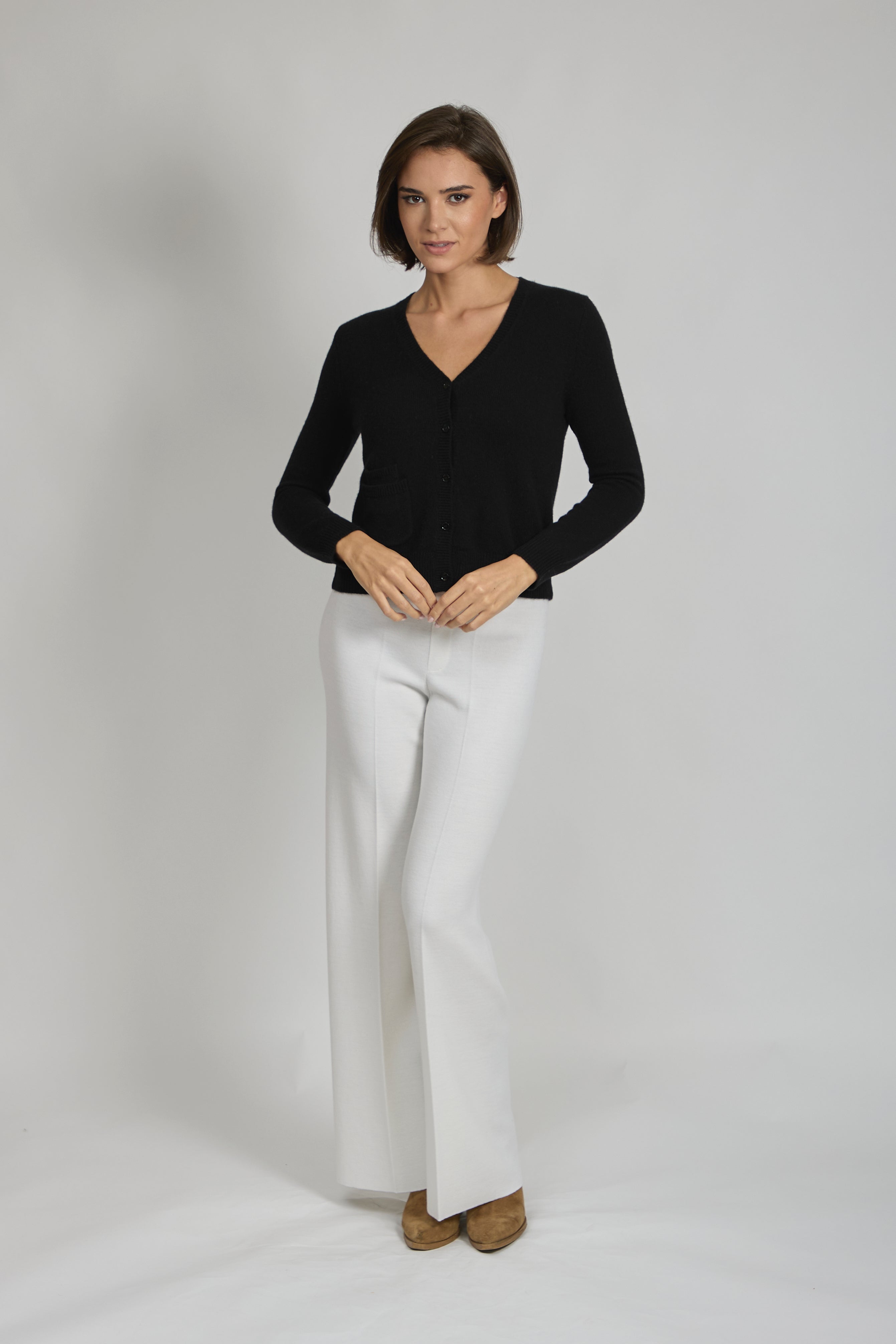 Short cashmere cardigan with a cropped silhouette and minimal detailing