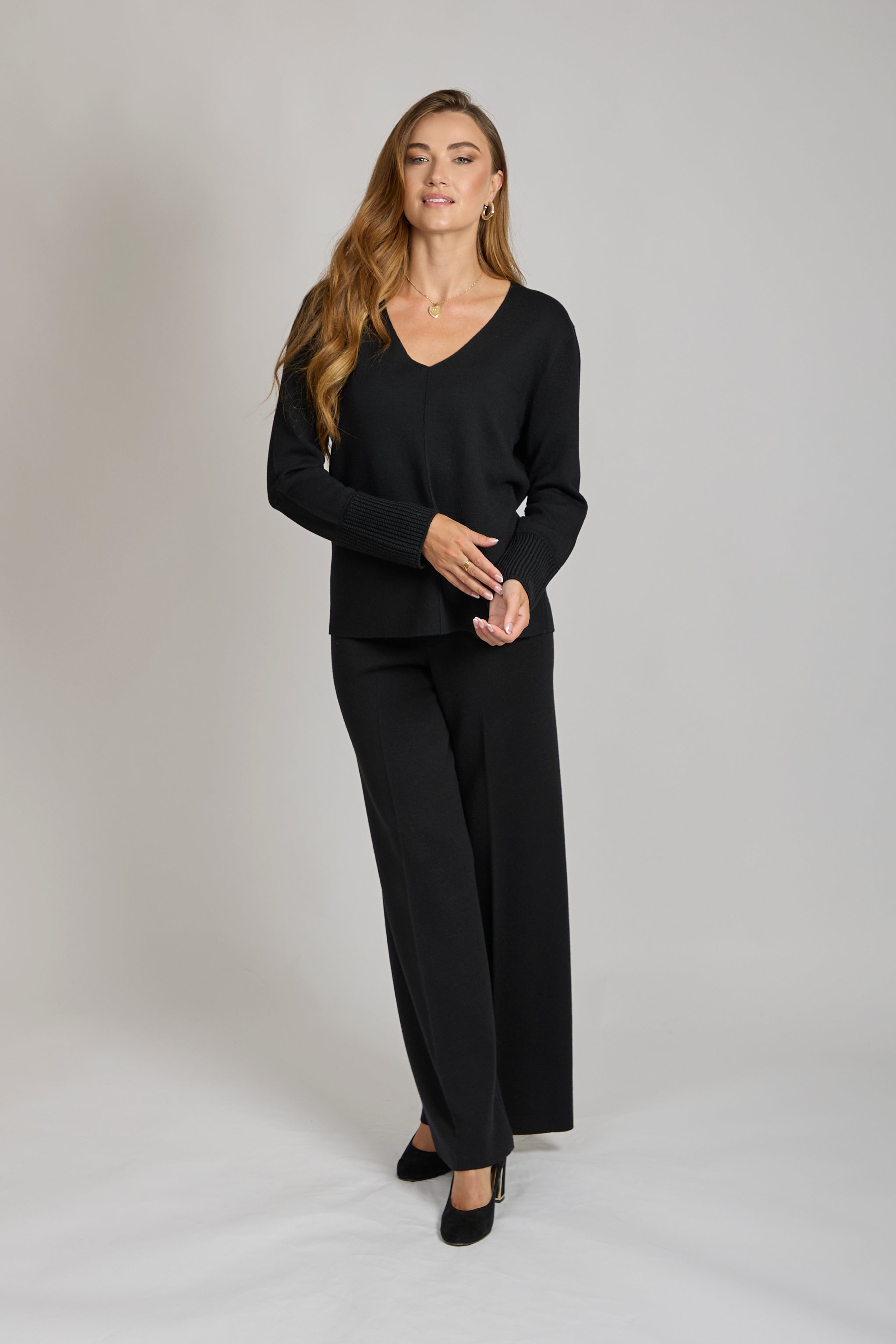 Tailored wool trousers with straight-leg cut and pressed crease.