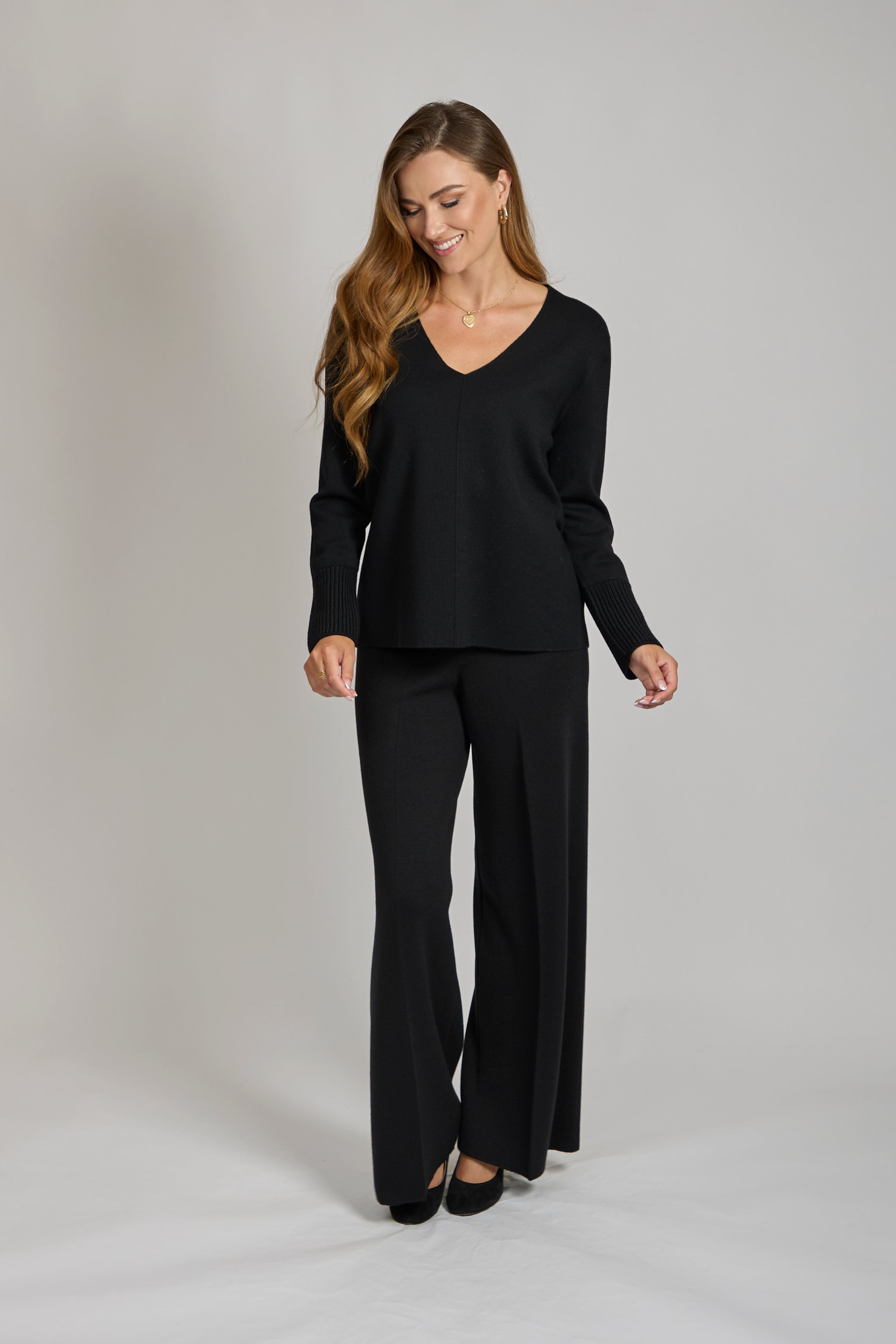 Divine Cashmere tailored wool trousers with a clean front and tailored silhouette
