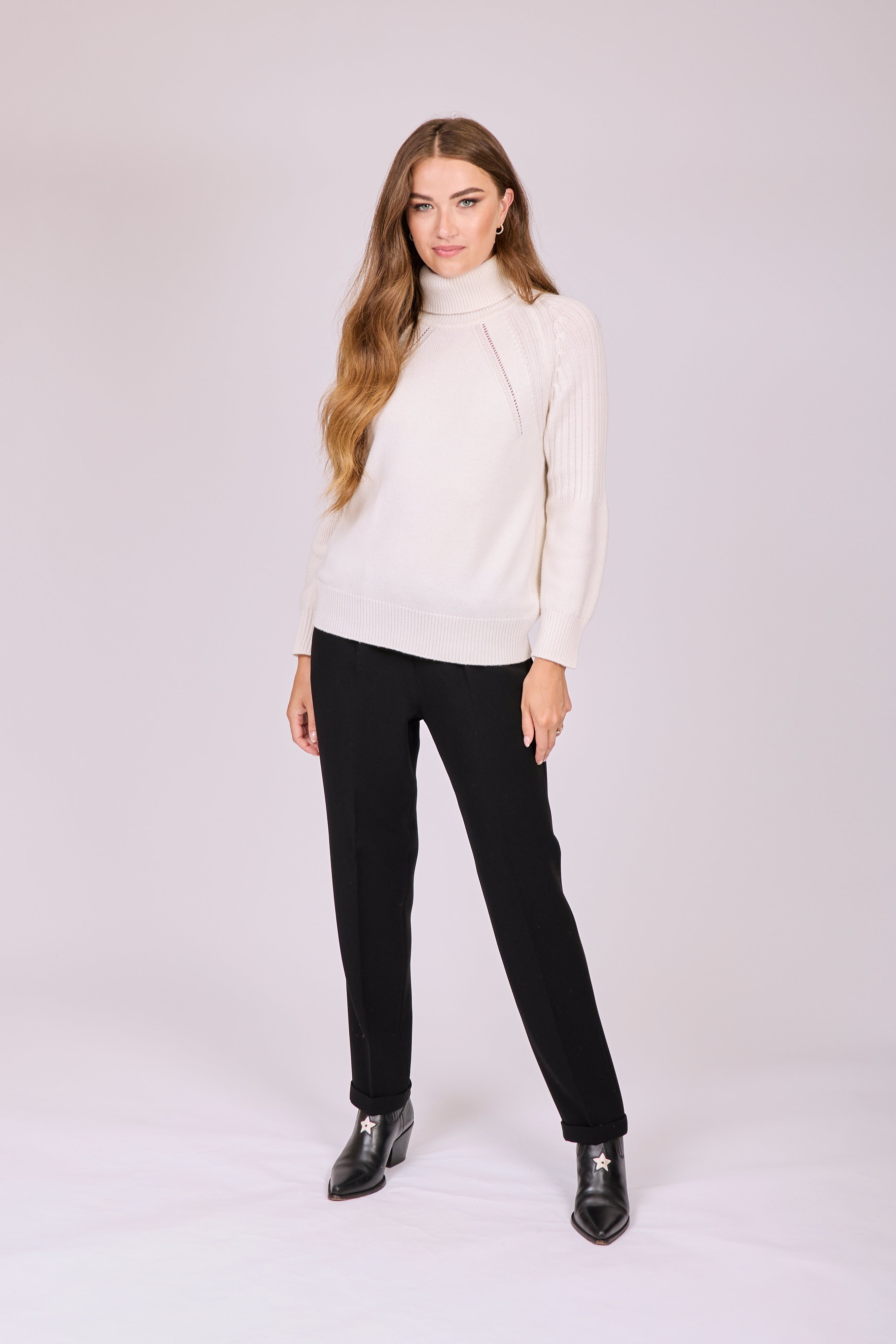 Black cashmere trousers with elastic waistband and straight, clean cut