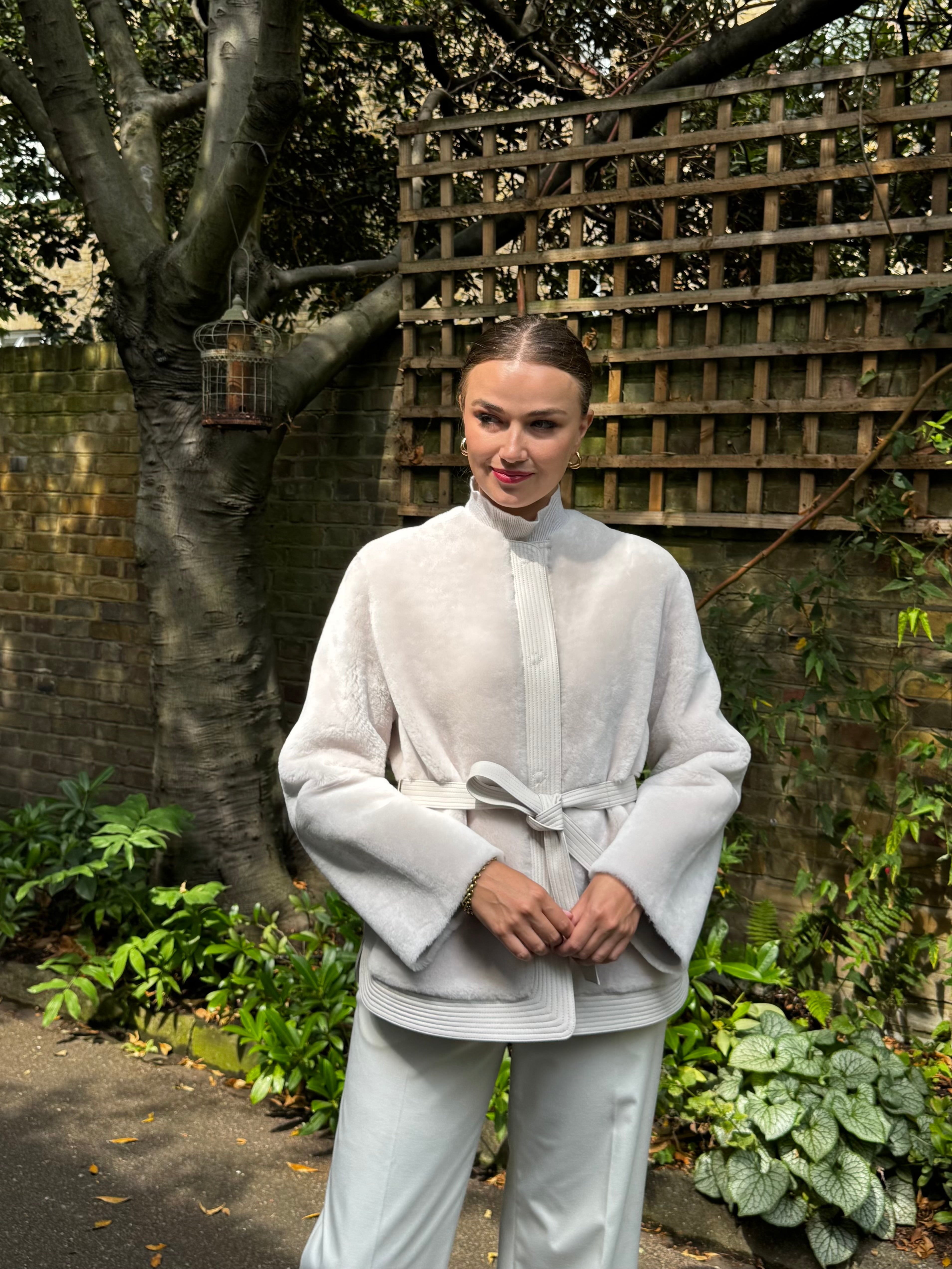 REVERSIBLE BELTED SHEARLING JACKET- MILK