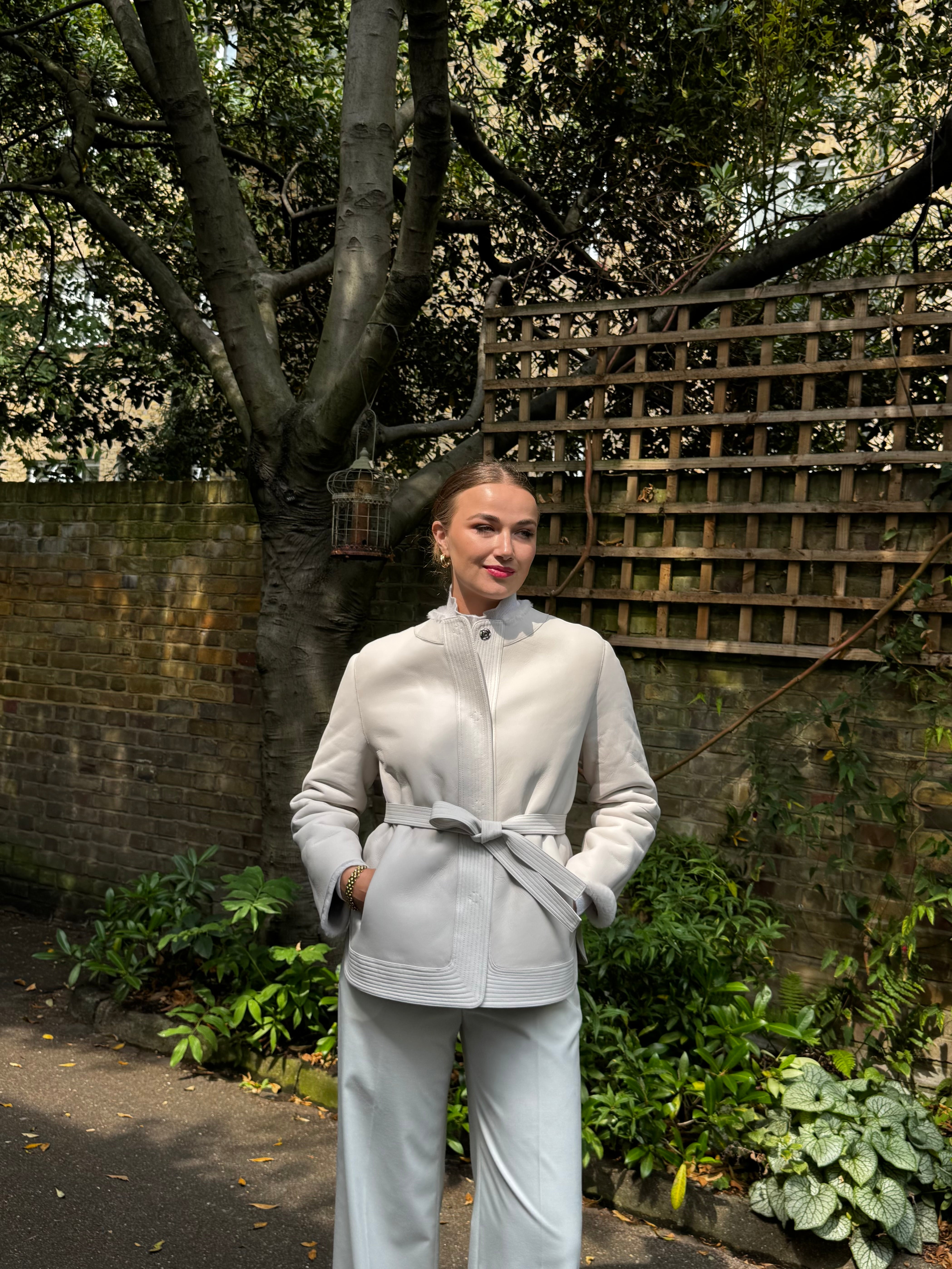 REVERSIBLE BELTED SHEARLING JACKET- MILK