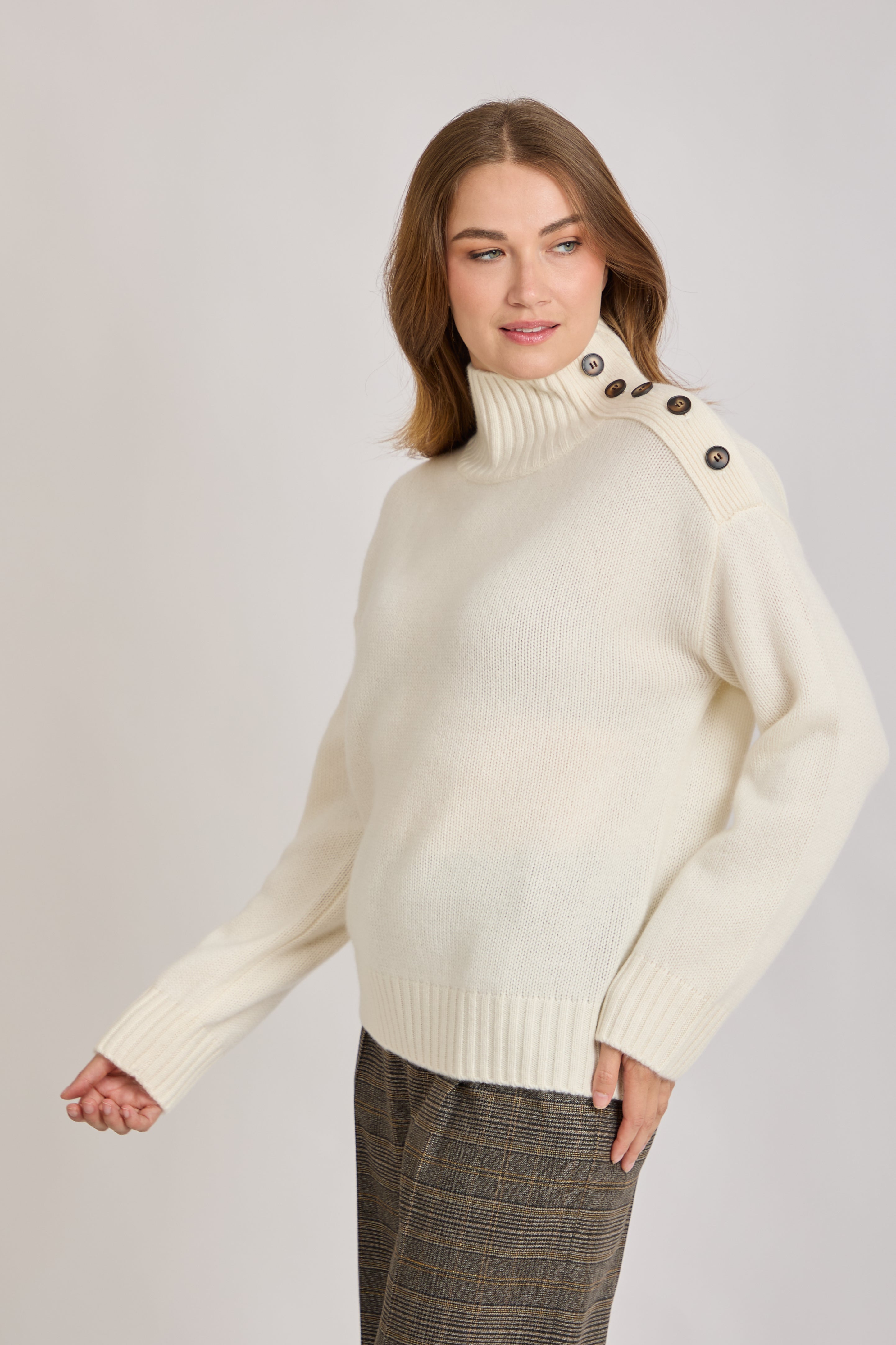 HIGH NECK JUMPER WITH BUTTONS AT THE SHOULDER - OFF WHITE
