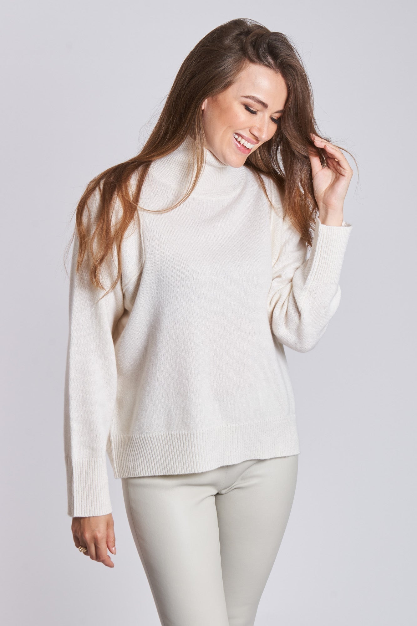 Divine Cashmere Off White high-neck cashmere jumper with ribbed neck, long sleeves and relaxed fit