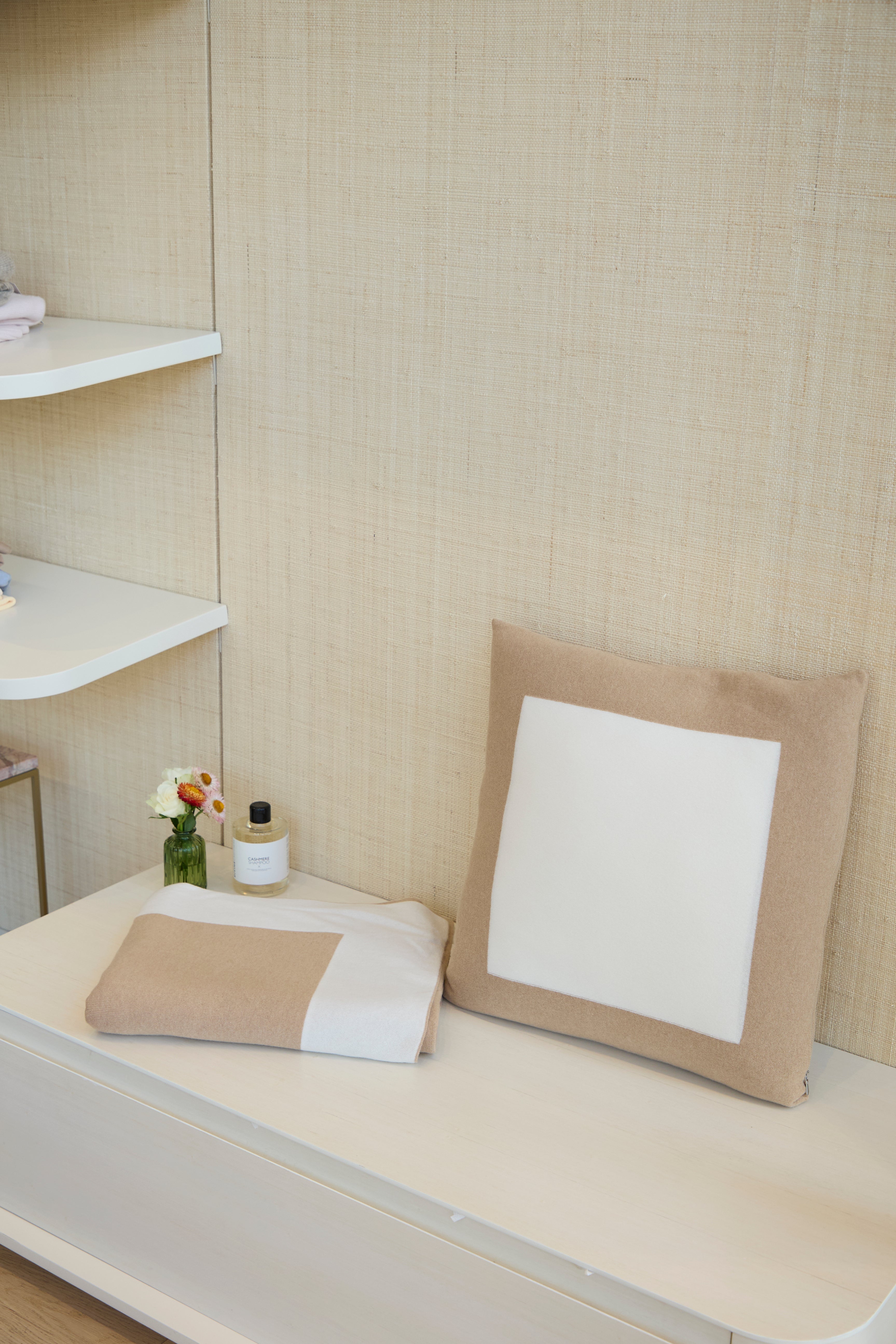 Divine Cashmere Nocciala cashmere throw pillow with plush texture and subtle seam detailing.