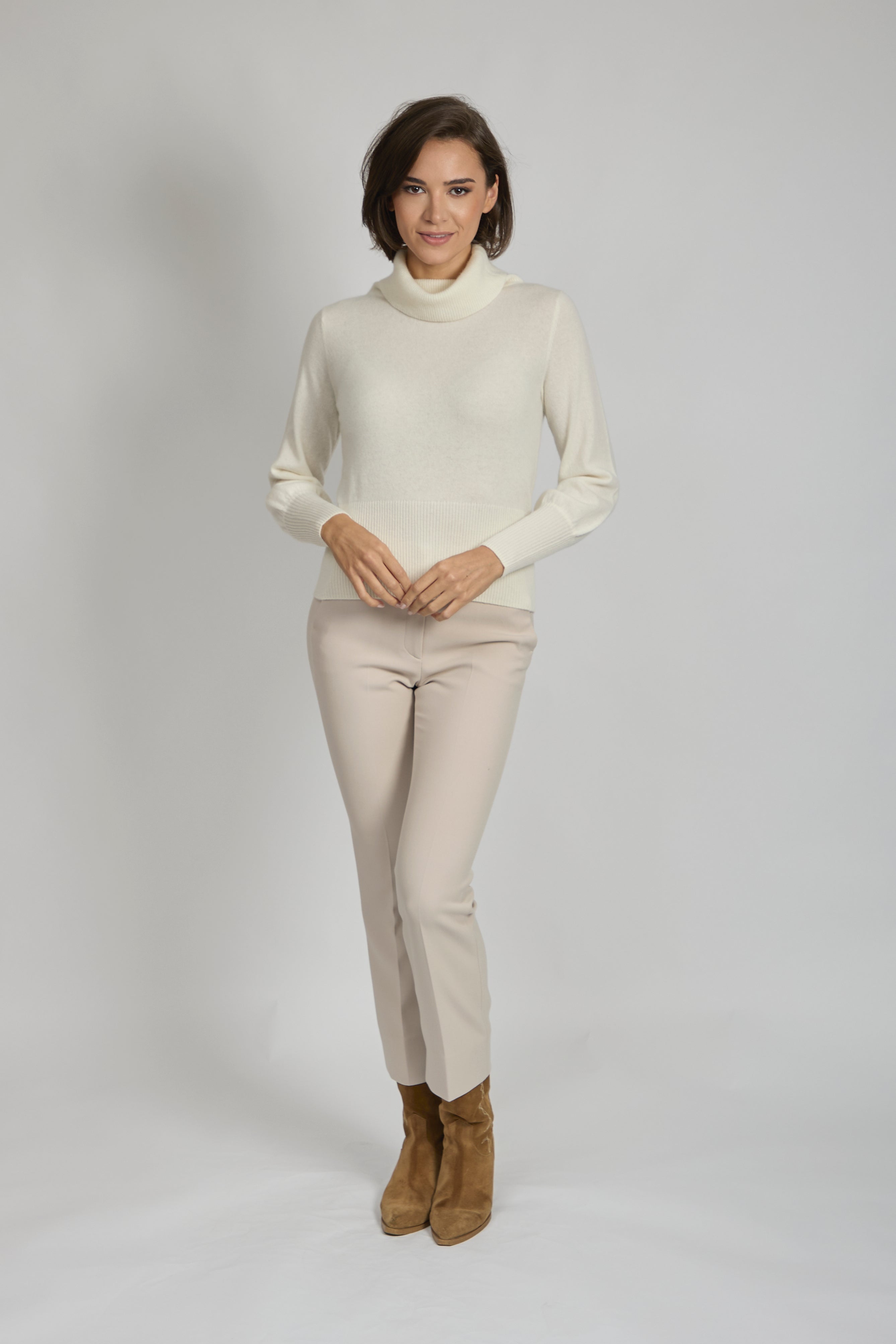 Divine Cashmere roll neck cashmere jumper with balloon sleeves, ribbed cuffs and relaxed silhouette