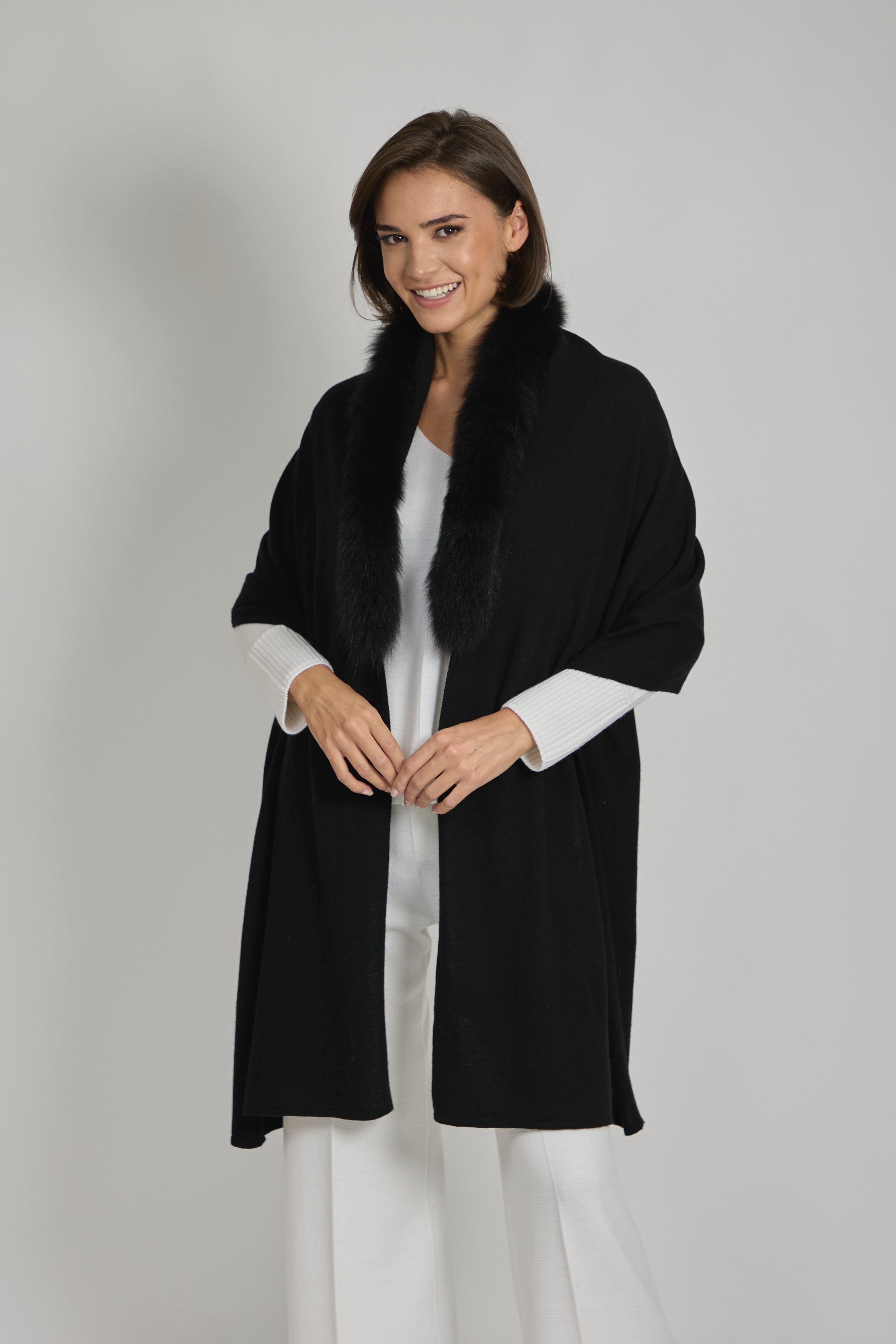 Divine Cashmere cashmere scarf with fur trim and soft knit texture