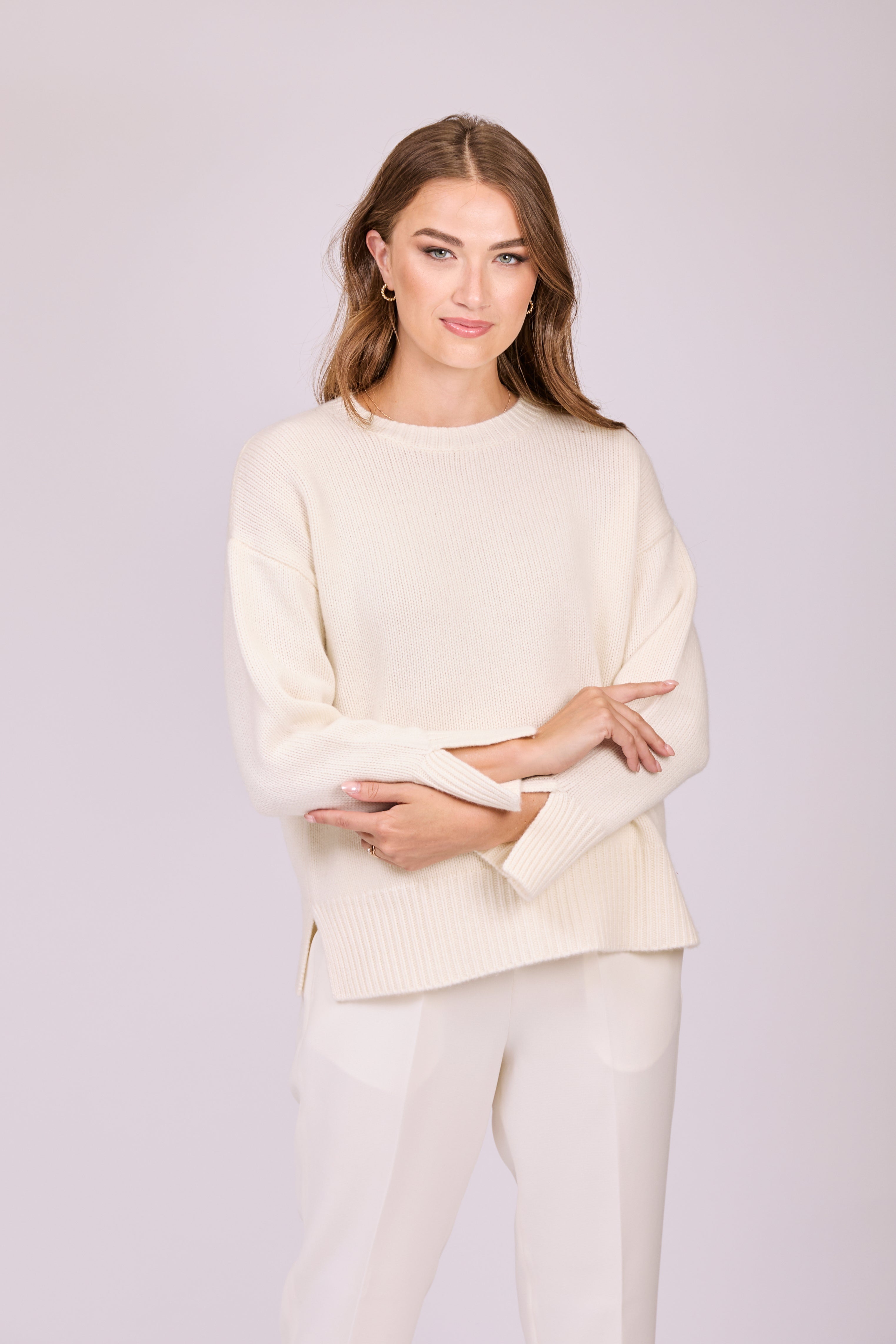 White thick cashmere crew-neck sweater with slit sleeves, relaxed silhouette