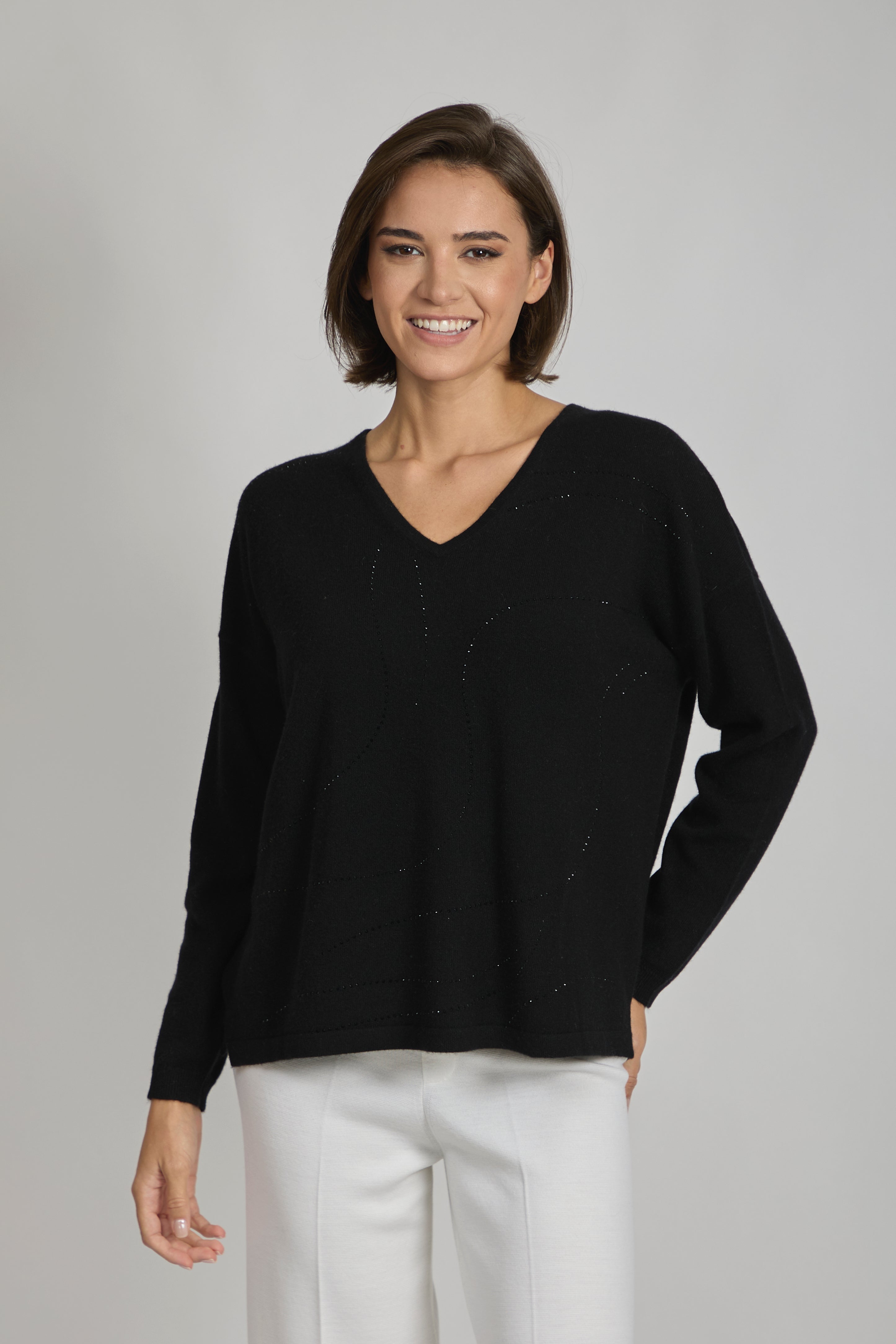Black cashmere V-neck jumper with sequin embellishments, long sleeves and relaxed fit.