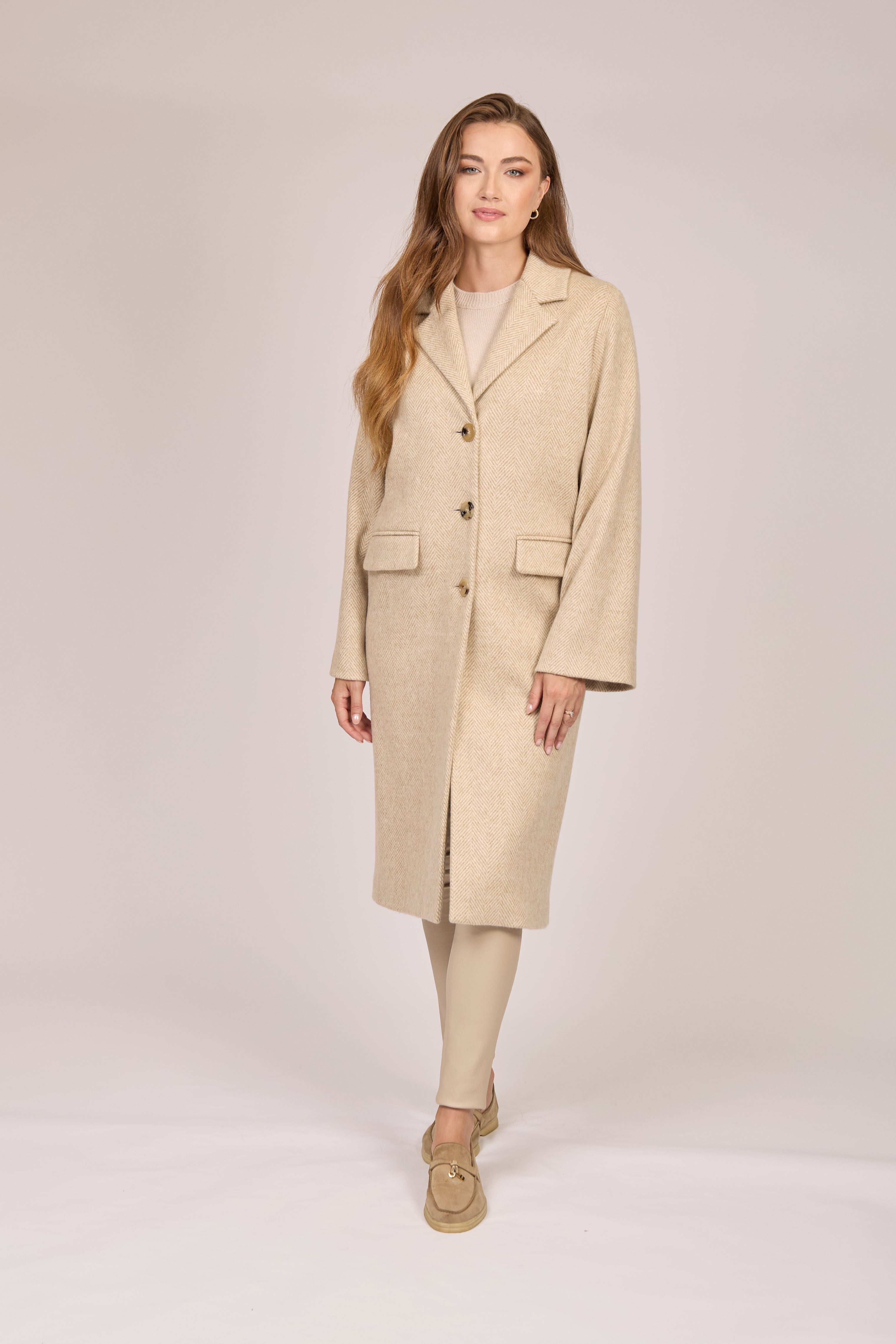 Herringbone cashmere coat with tailored cut and textured weave