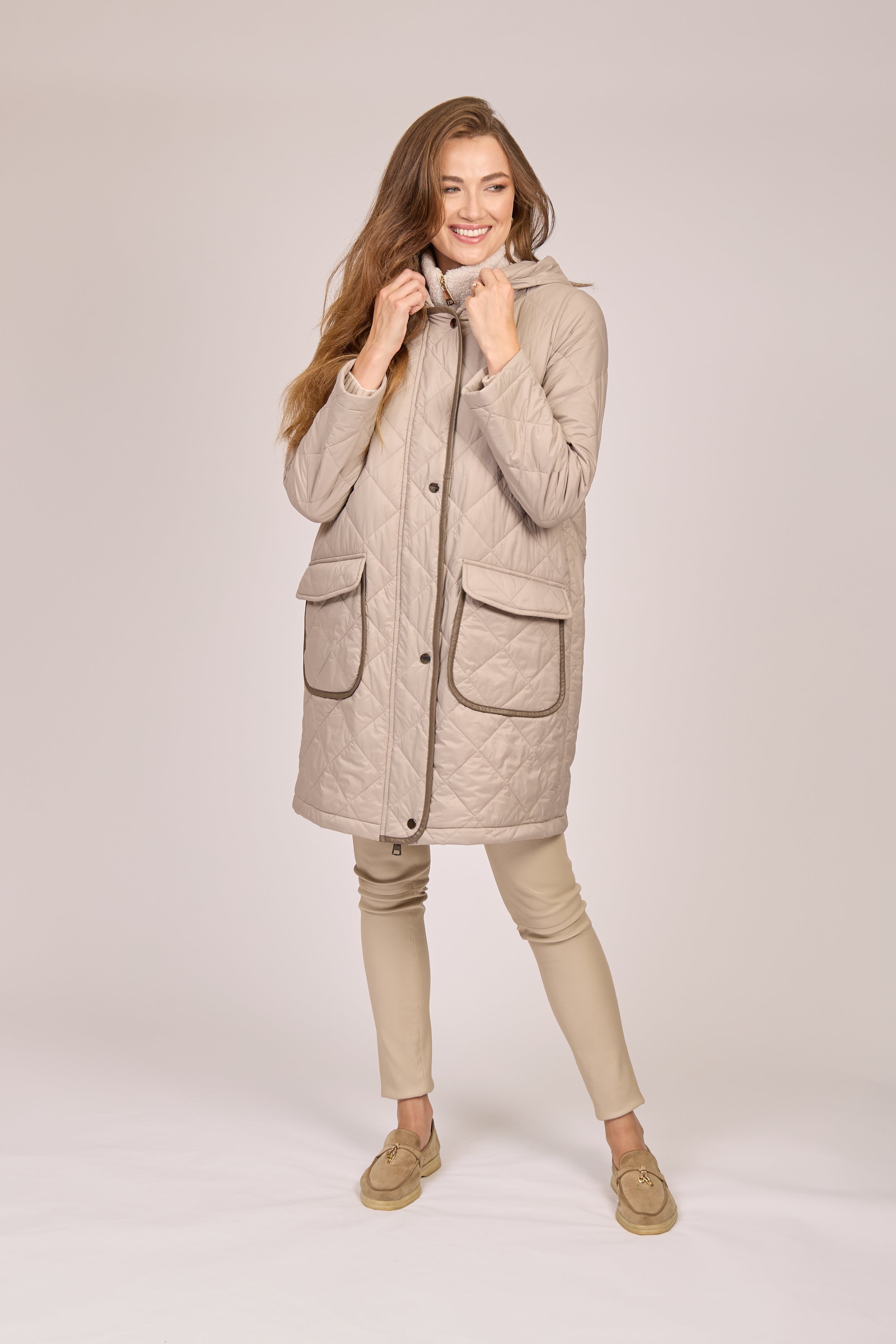 Taupe hooded quilted cashmere coat by Divine Cashmere with stitched quilting and long sleeves