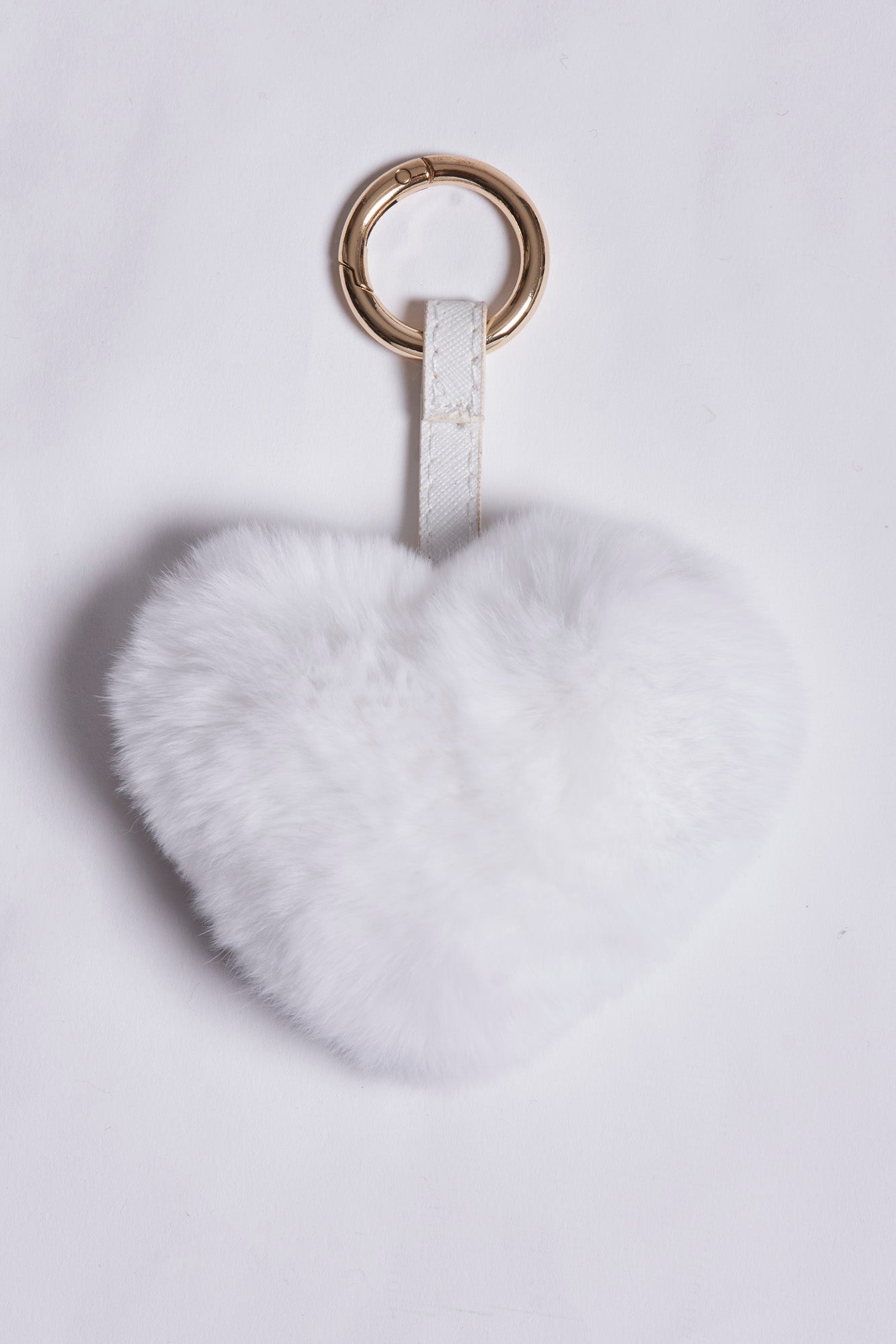 Divine Cashmere plush fur bag charm with metal clasp and attachment loop