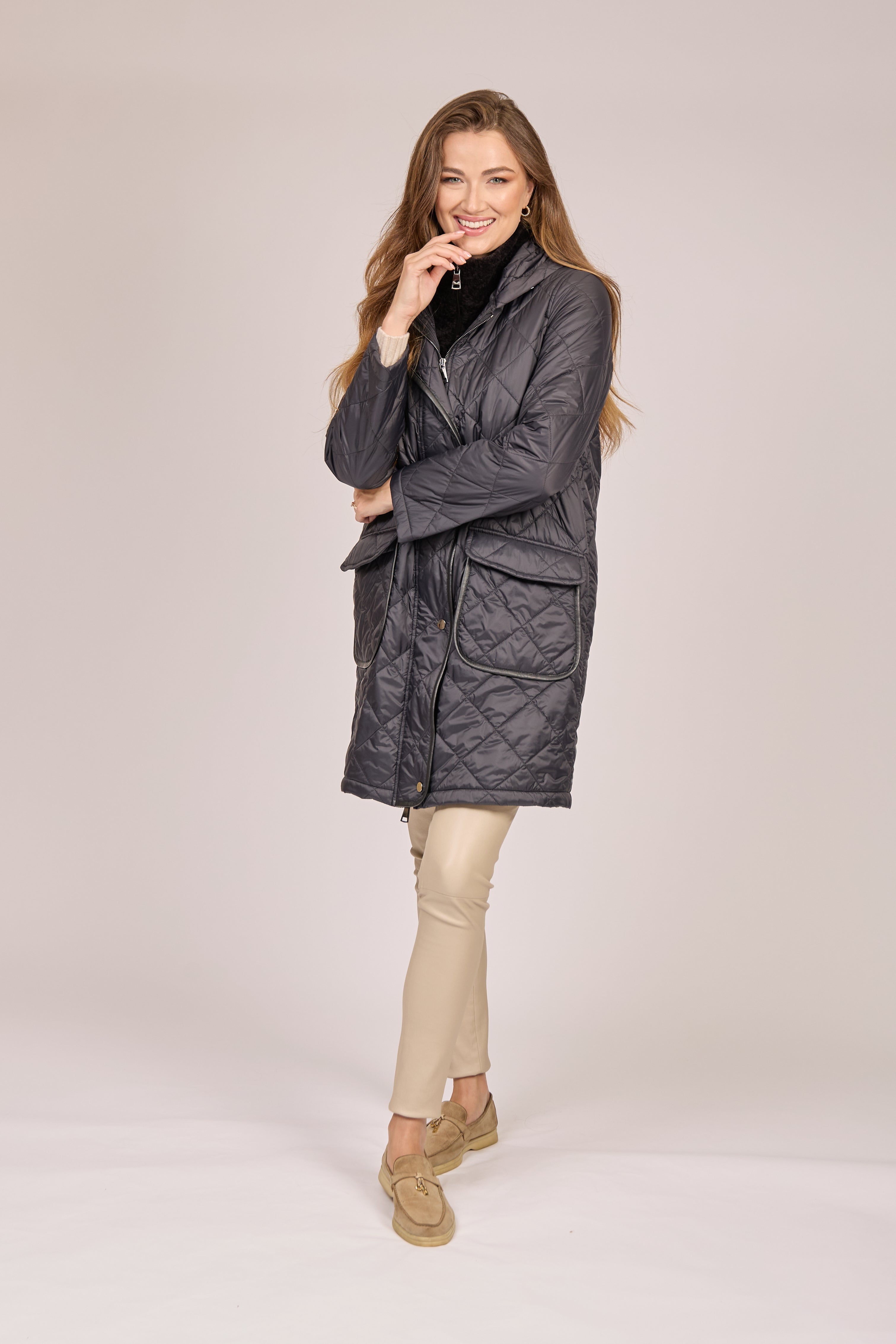 Divine Cashmere hooded coat in Black with quilted stitching and relaxed silhouette.