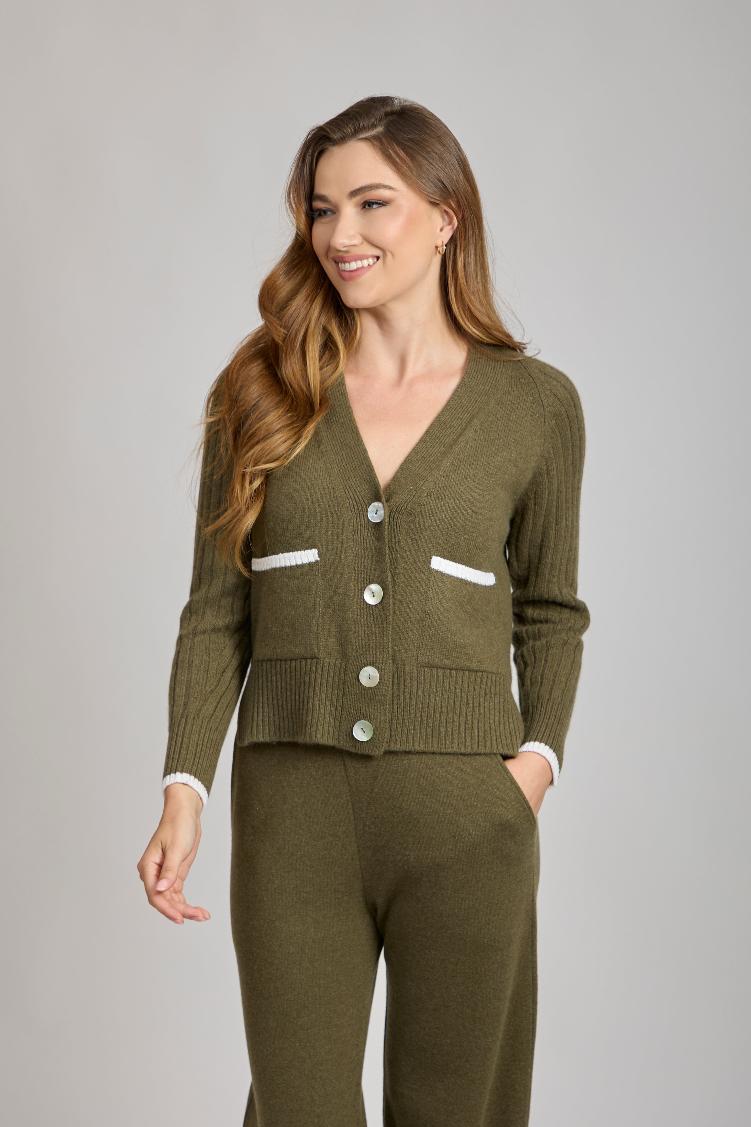 Divine Cashmere ribbed cashmere cardigan with long sleeves and textured knit.